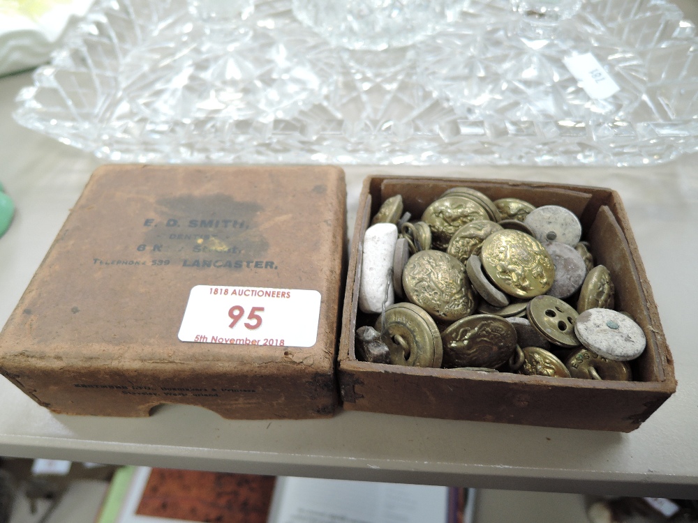 A selection of vintage military buttons