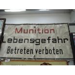 A vintage tin sign for German Munition