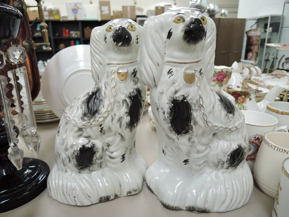 A pair of vintage Staffordshire flat back dogs