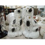 A pair of vintage Staffordshire flat back dogs