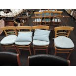 A set of 4 vintage beech kitchen chairs