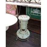 A vintage Aladdin paraffin heater