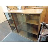 A vintage oak glass fronted bookcase