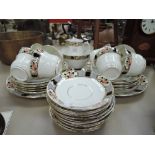 a vintage part tea service un marked with hand decorated edgework