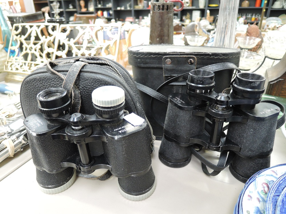 Two sets of vintage binoculars including Yashica and Photax