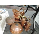 A selection of vintage copper wares including chocolate pot and jug