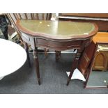 A reproduction demi lune hall table with frieze drawer and leather skiver inset top