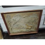 A vintage African theme relief wall plaque