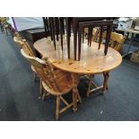 A traditional pine dining table and 4 chairs