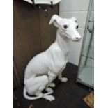 a large white glaze ceramic dog figure of a grey hound slight break to foot