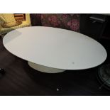A vintage Arkana coffee table, on painted tulip style base, in white