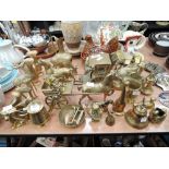 A selection of vintage brass wares including horse and carriage