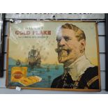A vintage tin advertising sign for Will's Gold Flake with Francis Drake design