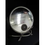 A vintage shaving mirror and lights by Harcourts