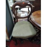 A Victorian mahogany balloon back dining chair
