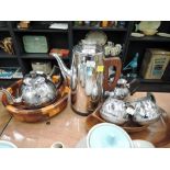 A selection of vintage wooden bowls and Swan brand tea set