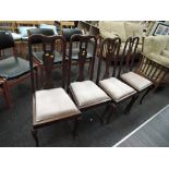 A set of four early 20th Century mahogany queen Anne style dining chairs