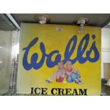 A vintage tin advertising sign for walls ice cream