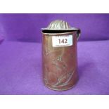 a vintage copper container with art nouveau design