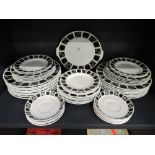 A vintage part dinner service by Midwinter in the Focus pattern