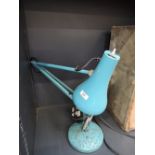 A vintage teal blue original angle poise lamp