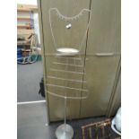 A vintage jewellery and dress stand