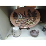 A selection of vintage ceramics including terracotta display plate