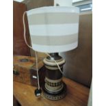 A vintage Jersey Pottery table lamp