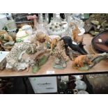 A selection of vintage big cat figures from the Franklin mint 9 in total