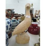 A vintage hand carved gull figure