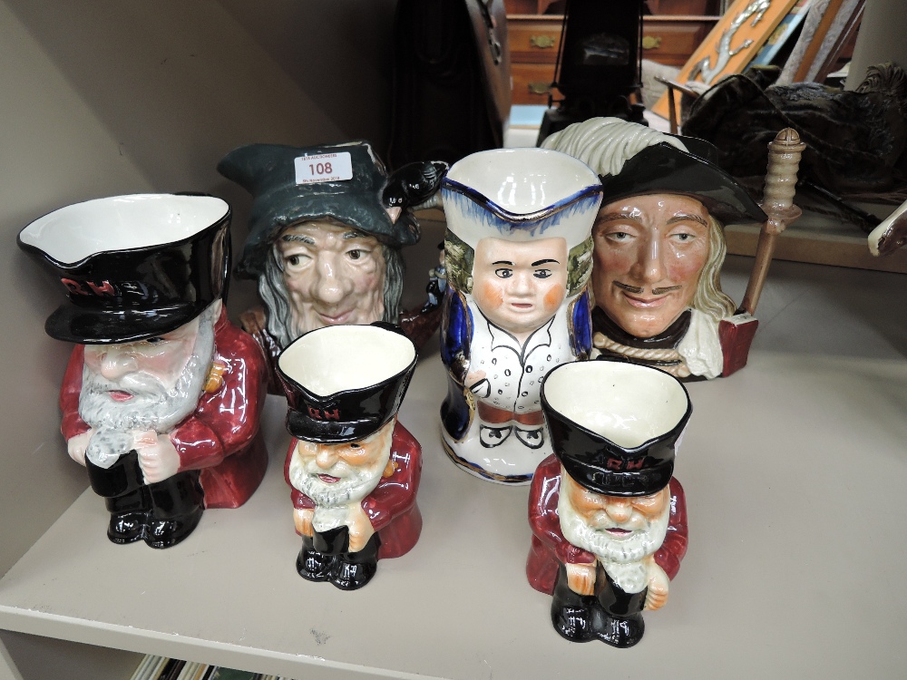 A selection of vintage ceramic toby jugs and similar including Royal Doulton