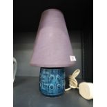 A vintage 70's design table lamp with blue glaze base