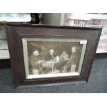 a vintage photograph of working men playing cards