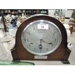 A vintage mantle clock with chime by Smiths