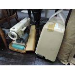 A vintage sewing machine in case by Jones (681B)