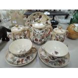 A vintage ceramic tea set for two Japanese Satsuma ware hand decorated