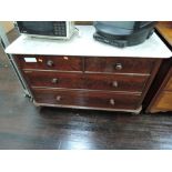 A Victorian mahogany chest of two over two drawers having marble top