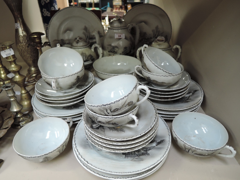 A vintage hand decorated egg shell tea set