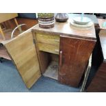 A mid 20th Century oak cabinet (ex sewing machine)