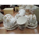 A selection of vintage tea cups and saucers including Colclough