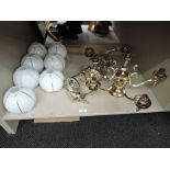 A selection of vintage brass and milk glass light fittings