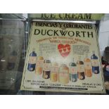A vintage card advertising sign for Duckworth beverages