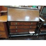 An early to mid 20th Century mahogany bureau