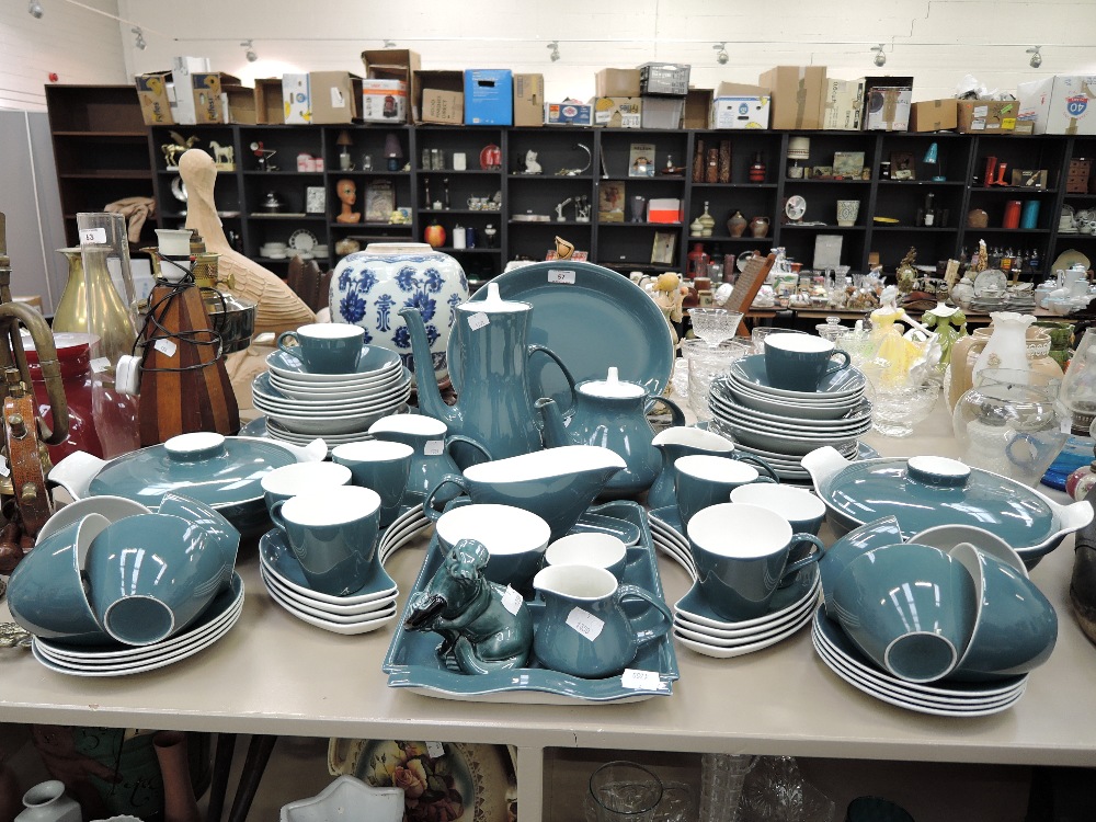 A large part dinner tea coffee service by Pool pottery in a teal two tone design