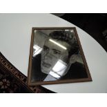A vintage mirror, having James Dean photographic design
