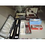 A selection of vintage boxed flatware and cutlery