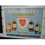 A vintage card advertising sign for Duckworths essences and colours