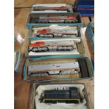 Five Athearn HO scale American brass Santa Fe locomotives, 2418, 690, 104, 69 & 74, one with a