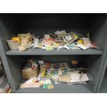 Two shelves of HO scale accessories including Walthers, Rix Products, Woodland Scenics etc, all on
