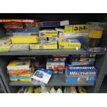 Two shelves of Walthers, Atlas, Faller and similar HO scale accessory kits, all boxed